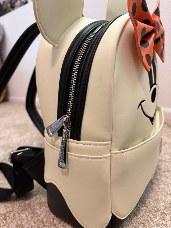 Loungefly Cream Minnie Mouse Backpack with Orange and Black Polka Dot Bow Glows main image 8
